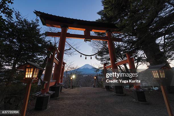 mount fuji under a tori gate - shinto stock pictures, royalty-free photos & images