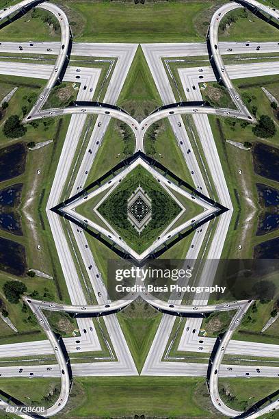 abstract image: kaleidoscopic image of aerial view of highways intersections in orlando, florida - orlando florida aerial stock pictures, royalty-free photos & images