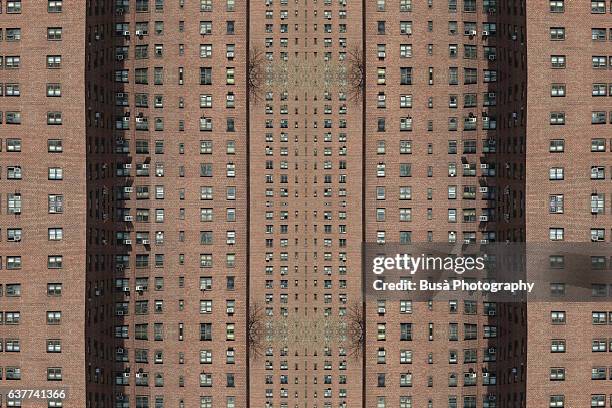 abstract image: kaleidoscopic image of public housing project in new york city, usa - council housing stock-fotos und bilder
