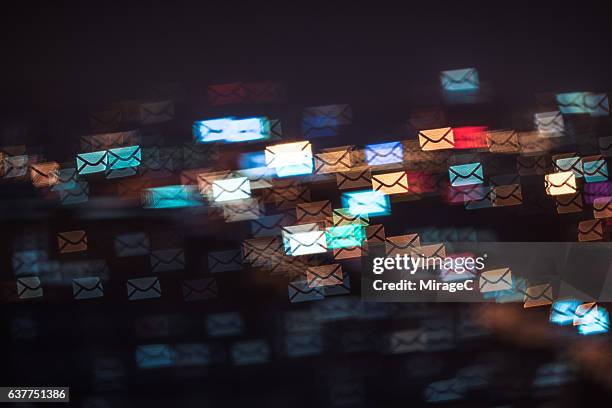 flying envelope message in city night - street light post stock pictures, royalty-free photos & images