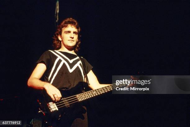 Canadian rock band Saga in concert at Hammersmith Odeon. Pictured, Jim Crichton. 10th November 1983.