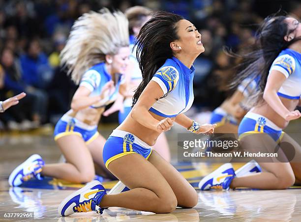 The Golden State Warriors Dance Team performs during an NBA basketball game between the Denver Nuggets and Golden State Warriors at ORACLE Arena on...