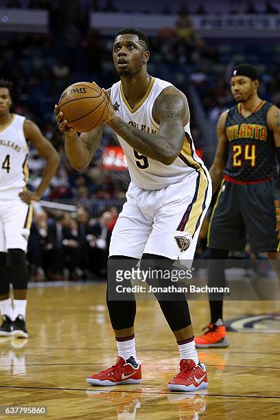 Terrence Jones of the New Orleans Pelicans shoots a foul shot during the second half of a game against the Atlanta Hawks at the Smoothie King Center...