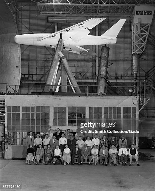 Group portrait of staff of NASA/NACA Full Scale Tunnel at Langley Research Center, including several "human computers"; L-R Row 1: Virginia Taylor ,...