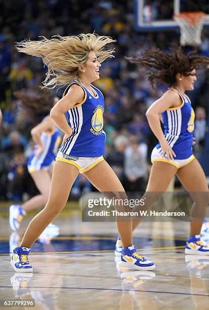 The Golden State Warriors Dance Team performs during an NBA basketball game between the Portland Trail Blazers and Golden State Warriors at ORACLE...