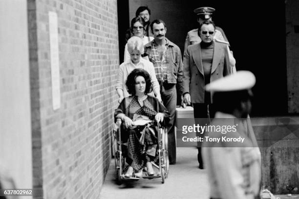 Liz Taylor and Richard Burton Leaving University Hospital of Los Angeles