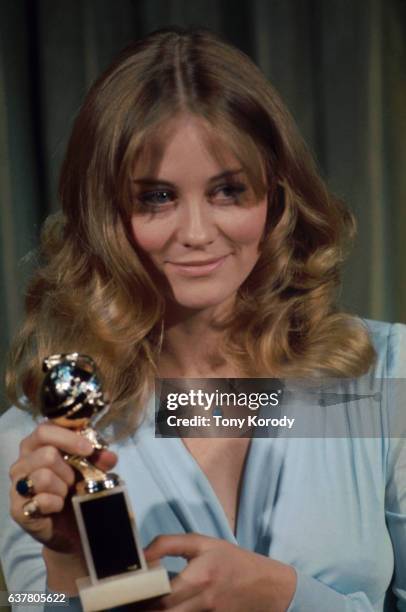 Movie actress Cybill Shepherd holds a Golden Globe Award during the 1973 Golden Globe Award ceremony. She was a presenter at the awards show.