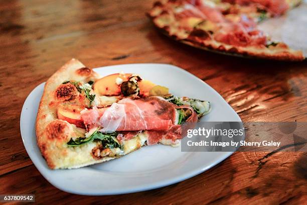 slice of peach pizza - niagara on the lake stock pictures, royalty-free photos & images