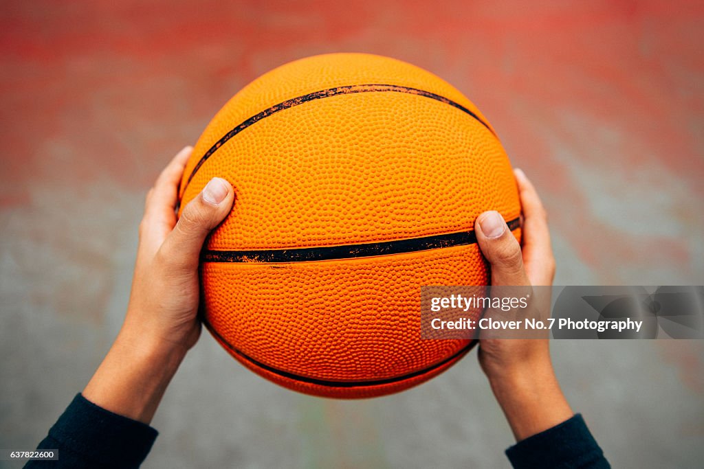 Holding a basketball hand, POV.