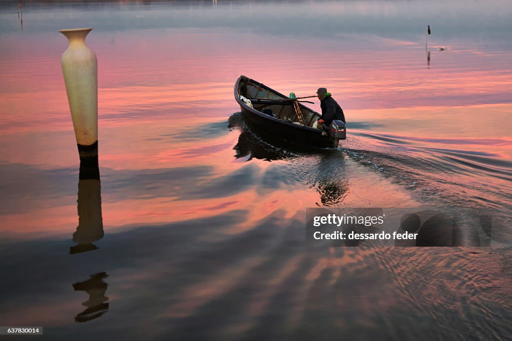 Boat with fisherman on the move