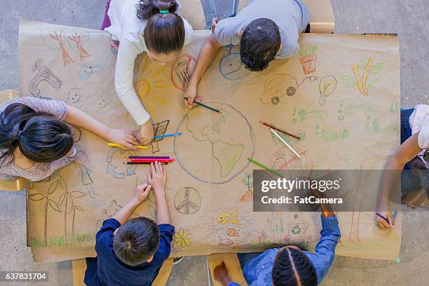 save the earth - child globe stockfoto's en -beelden