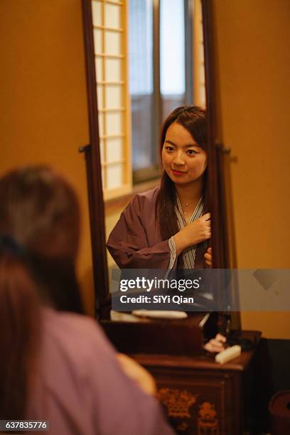 girl in kimono sitting in traditional japanese house - qian siyi stock pictures, royalty-free photos & images