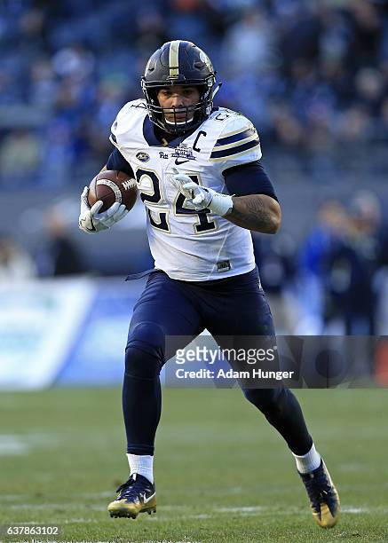 Running back James Conner of the Pittsburgh Panthers in action against the Northwestern Wildcats during the New Era Pinstripe Bowl at Yankee Stadium...