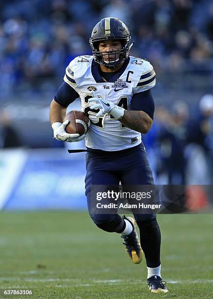 Running back James Conner of the Pittsburgh Panthers in action against the Northwestern Wildcats during the New Era Pinstripe Bowl at Yankee Stadium...