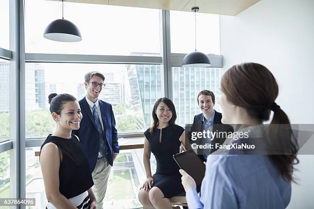 business team meeting in office - delegating stock pictures, royalty-free photos & images