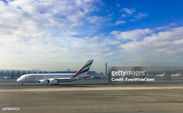 Airbus A 380 aircraft passenger jet at departure and take-off at Dubai International Airport on December 17, 2016 in Dubai, United Arab Emirates.