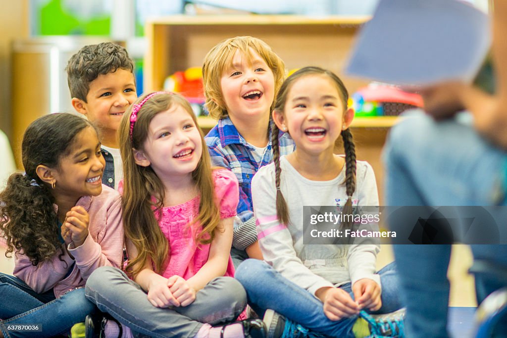 Teacher Reading to Her Students