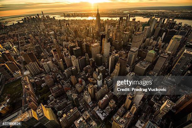 sunset in new york - queens new york city stock pictures, royalty-free photos & images