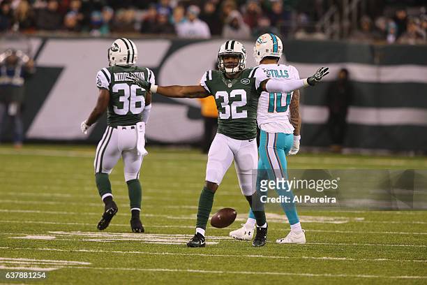 Cornerback Juston Burris of the New York Jets has his first career Interception against the Miami Dolphins at MetLife Stadium on December 17, 2016 in...