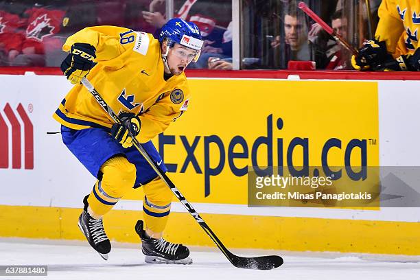 Rasmus Asplund of Team Sweden skates the puck during the 2017 IIHF World Junior Championship bronze medal game against Team Russia at the Bell Centre...