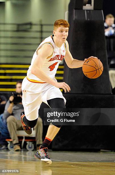 Kevin Huerter of the Maryland Terrapins handles the ball against the Charlotte 49ers at Royal Farms Arena on December 20, 2016 in Baltimore, Maryland.