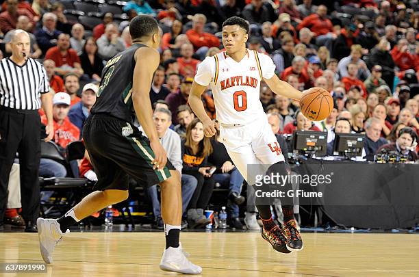 Anthony Cowan of the Maryland Terrapins handles the ball against the Charlotte 49ers at Royal Farms Arena on December 20, 2016 in Baltimore, Maryland.