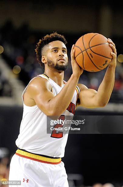 Melo Trimble of the Maryland Terrapins shoots a free throw against the Charlotte 49ers at Royal Farms Arena on December 20, 2016 in Baltimore,...