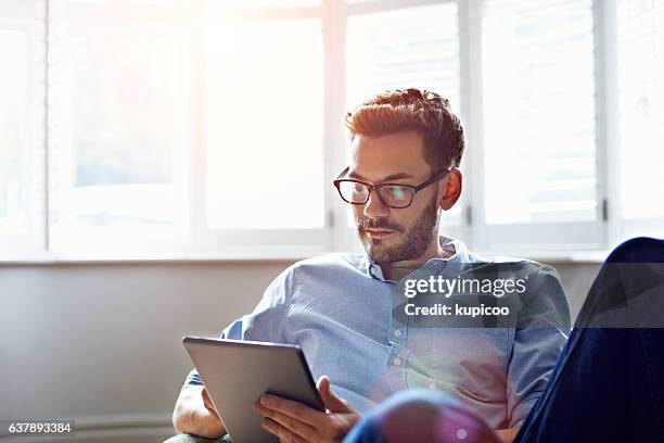 staying connected throughout the day - spectacles man stock pictures, royalty-free photos & images