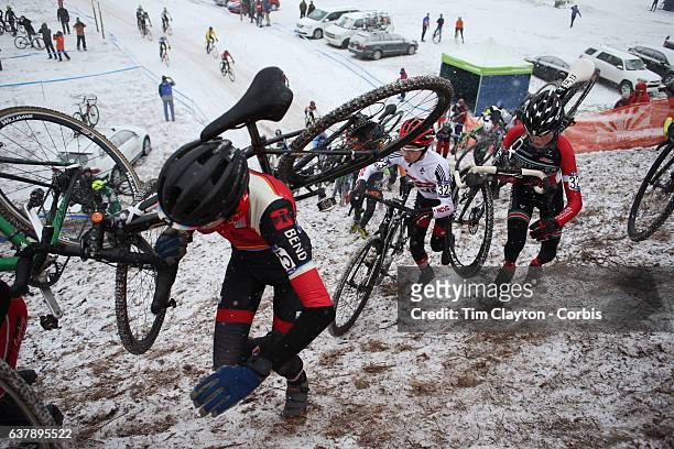 Competitors tackle an uphill climb in the Men Junior 15-16 competition during the Cyclocross National Championships on January 7th, 2017 at Riverside...