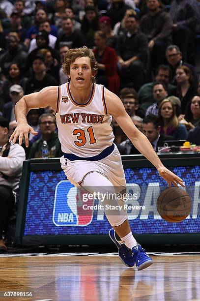 Ron Baker of the New York Knicks drives to the basket during a game against the Milwaukee Bucks at BMO Harris Bradley Center on January 6, 2017 in...