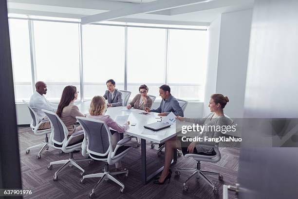 group business meeting in office conference room - styrelse bildbanksfoton och bilder
