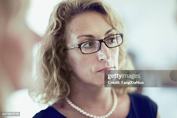 Woman Listener Woman Listening To Conversation At Social Event High-Res Stock Photo ...