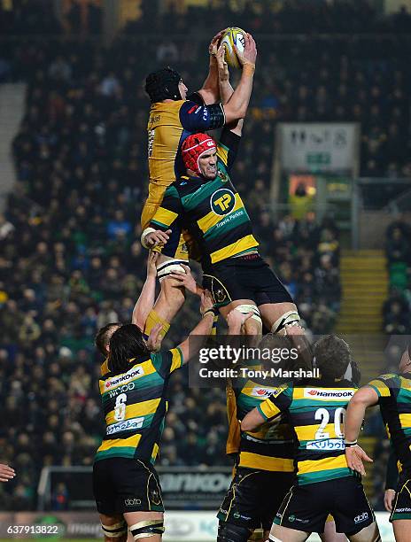 Christian Day of Northampton Saints and Mark Sorenson of Bristol Rugby grapple for the ball in the line out during the Aviva Premiership match...