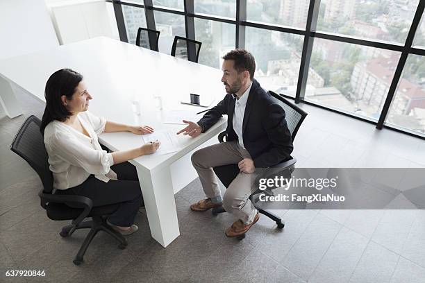 business people talking in office - attending stock pictures, royalty-free photos & images