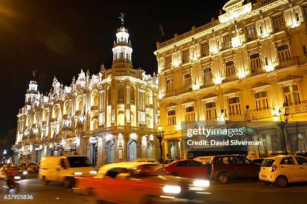 The Inglaterra Hotel, at right, is lit up at night on December 21, 2015 in Havana, Cuba. In a colonial-era building dating from 1875, this historic...