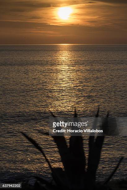 Sunset from Ponta do Sal on January 07, 2017 in Cascais, Portugal. Ponta do Sala is favored by locals and tourists who wish to watch sunset.