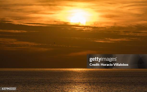 Sunset from Ponta do Sal on January 07, 2017 in Cascais, Portugal. Ponta do Sala is favored by locals and tourists who wish to watch sunset.