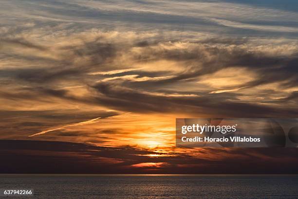 Sunset from Ponta do Sal on January 07, 2017 in Cascais, Portugal. Ponta do Sala is favored by locals and tourists who wish to watch sunset.