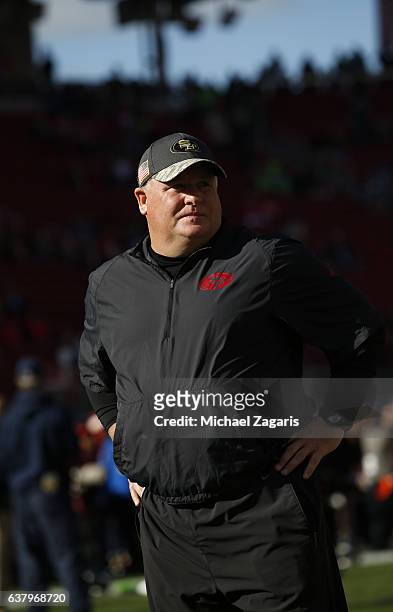 Head Coach Chip Kelly of the San Francisco 49ers stands on the field prior to the game against the Seattle Seahawks at Levi Stadium on January 1,...