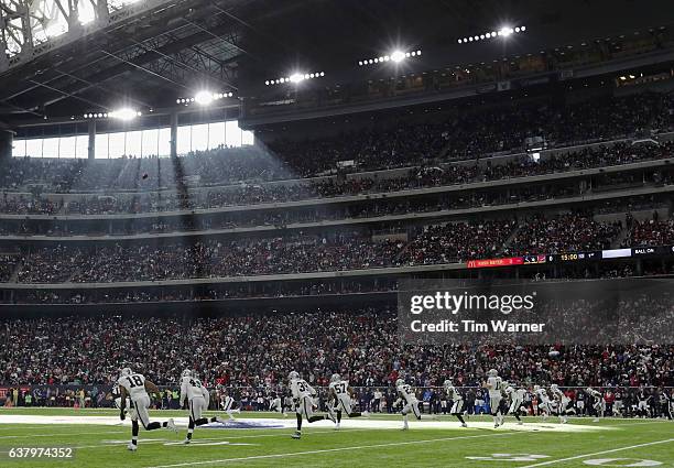 Sebastian Janikowski of the Oakland Raiders kicks off to start the game against the Houston Texans at NRG Stadium on January 7, 2017 in Houston,...