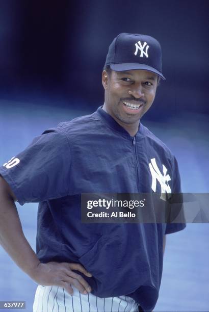 Third Base Coach Willie Randolph of the New York Yankees looks on and smiles during the game against the Seattle Mariners at Yankee Stadium in the...