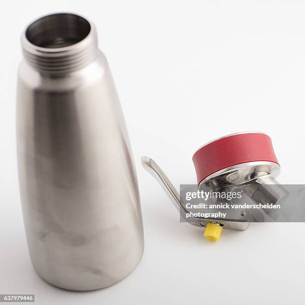 gourmet whip. device head and bottle. - whippet stock pictures, royalty-free photos & images