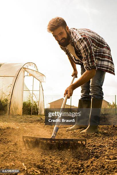 Farmer Man Rake 1,601 Farmer Rake Stock Photos, High-Res Pictures, and Images - Getty ...