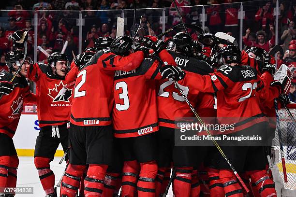 Team Canada celebrates a win over Team Sweden during the 2017 IIHF World Junior Championship semifinal game at the Bell Centre on January 4, 2017 in...