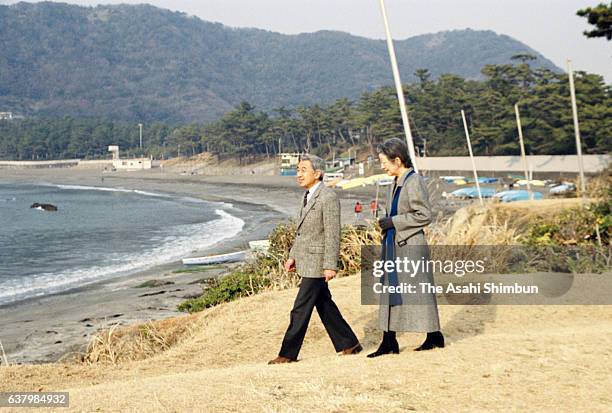 Emperor Akihito and Empress Michiko stroll outside the Hayama Imperial Villa on January 24, 2000 in Hayama, Kanagawa, Japan.