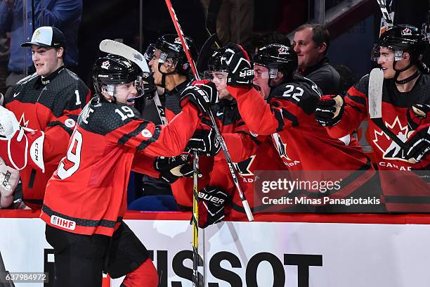 Dylan Strome of Team Canada celebrates his goal with teammates on the bench during the 2017 IIHF World Junior Championship semifinal game against...