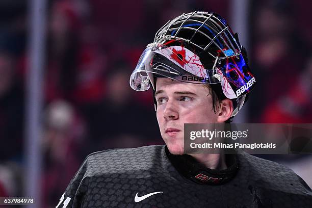 Carter Hart of Team Canada looks on during the 2017 IIHF World Junior Championship semifinal game against Team Sweden at the Bell Centre on January...