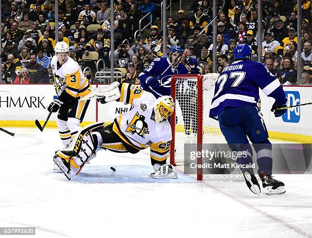 Marc-Andre Fleury of the Pittsburgh Penguins has a shot by Jonathan Drouin of the Tampa Bay Lightning get by him at PPG PAINTS Arena on January 8,...