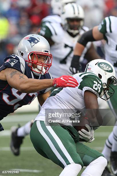 Defensive Lineman Jabaal Sheard of the New England Patriots makes a stop against the New York Jets at Gillette Stadium on December 24, 2016 in...