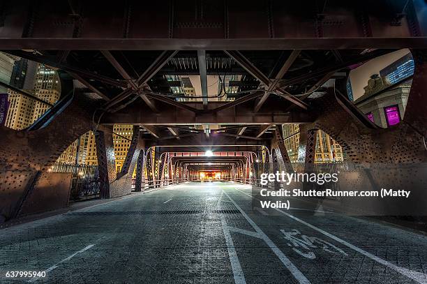 tunnel to the loop - city roads stock pictures, royalty-free photos & images